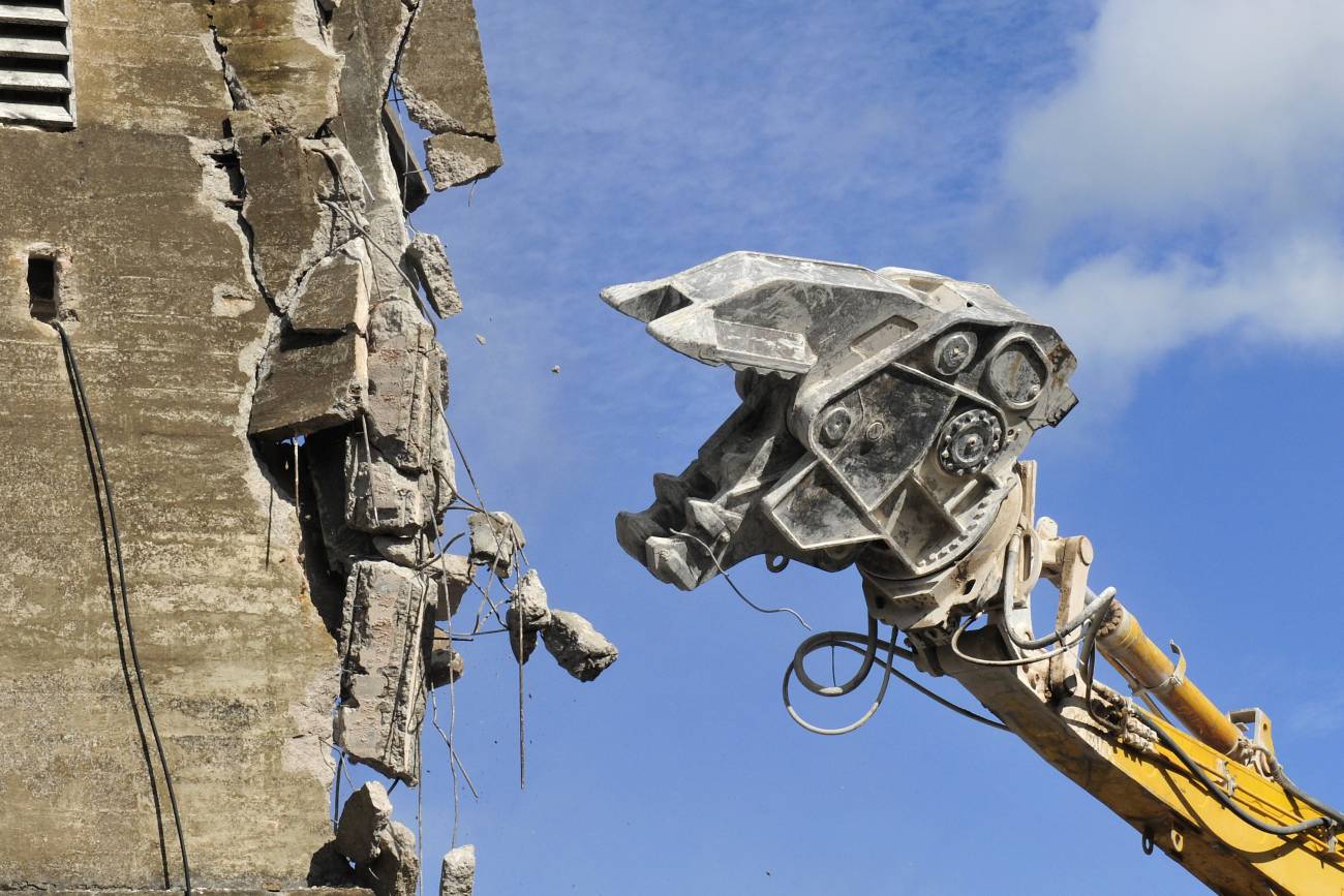 Demolition construction works with excavator